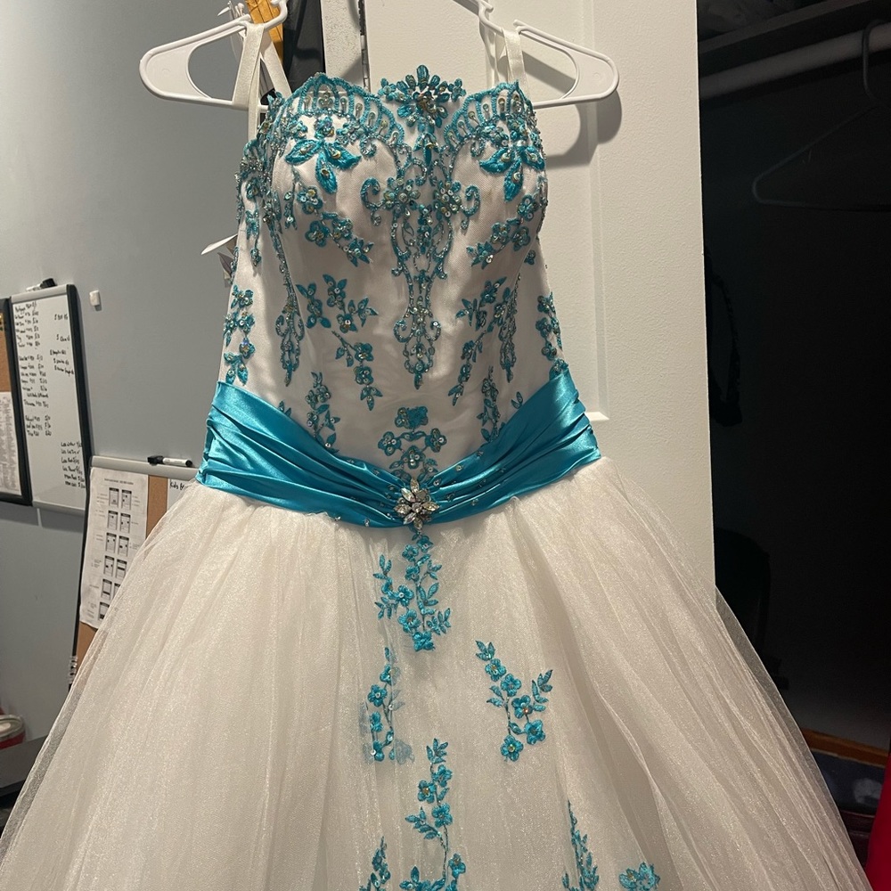 White prom/pageant dress. Super full bottom. White with blue detail and ribbon